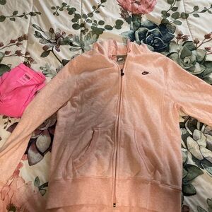 Nike zip up size (12/14) large fits me as an adult medium